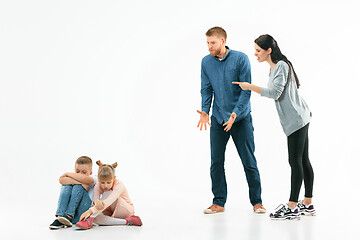 Image showing Angry parents scolding their children at home