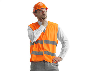 Image showing The builder in orange helmet isolated on white