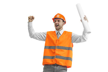 Image showing The builder in orange helmet isolated on white