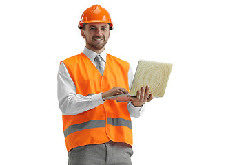 Image showing The builder in orange helmet isolated on white