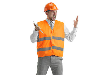 Image showing The builder in orange helmet isolated on white