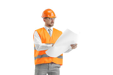 Image showing The builder in orange helmet isolated on white