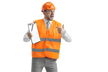 Image showing The builder in orange helmet isolated on white