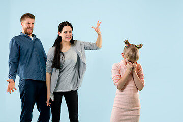 Image showing Angry parents scolding their daughter at home