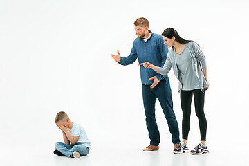 Image showing Angry parents scolding their son at home