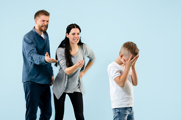 Image showing Angry parents scolding their son at home