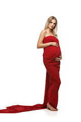 Image showing Pregnant girl in red dress