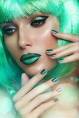 Image showing beautiful girl in green wig