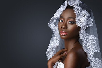 Image showing Beautiful african girl with veil hat