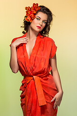 Image showing beautiful girl in orange dress