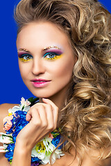 Image showing beautiful girl with flower accessories
