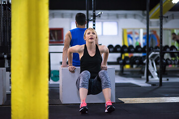 Image showing athletes working out their arms