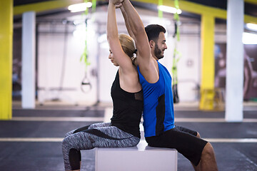 Image showing athletes working out their arms