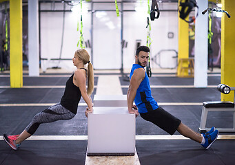 Image showing athletes working out their arms