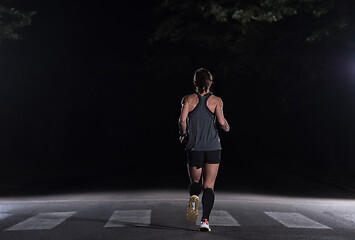 Image showing female runner training for marathon