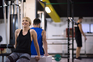 Image showing athletes working out their arms