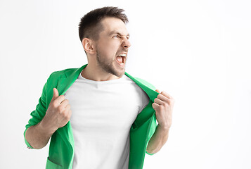 Image showing Young casual man shouting. Shout.