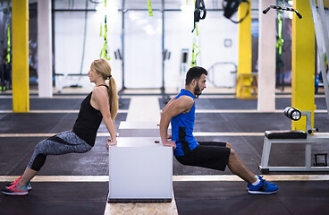 Image showing athletes working out their arms