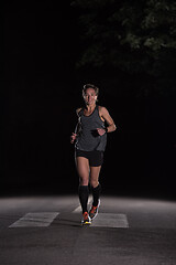 Image showing female runner training for marathon