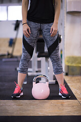 Image showing woman exercise with fitness kettlebell