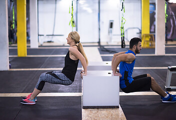 Image showing athletes working out their arms