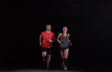 Image showing runners team on the night training