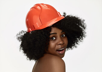 Image showing Portrait of confident female worker in orange helmet