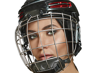 Image showing Female hockey player close up helmet and mask