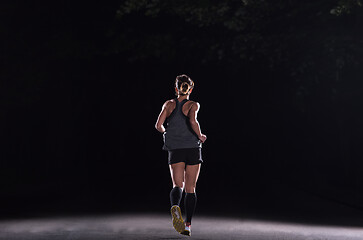 Image showing female runner training for marathon