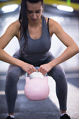 Image showing woman exercise with fitness kettlebell