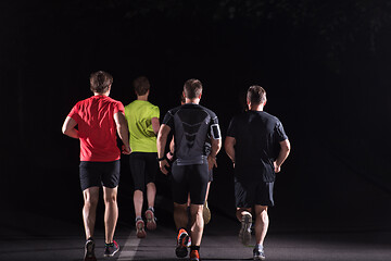 Image showing runners team on the night training