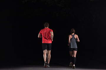 Image showing runners team on the night training