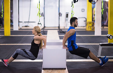 Image showing athletes working out their arms