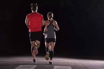 Image showing runners team on the night training