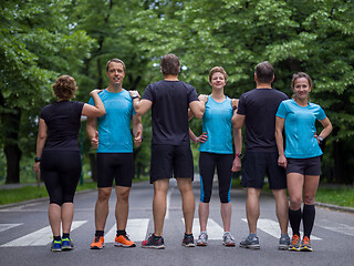 Image showing portrait of runners team on morning training