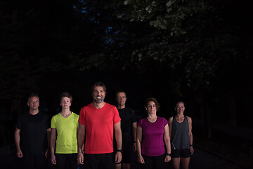 Image showing runners team on the night training