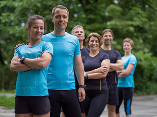 Image showing portrait of runners team on morning training