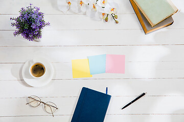 Image showing Message at colorful note papers on a desk background.