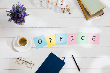 Image showing OFFICE. Message at colorful note papers on a desk background.