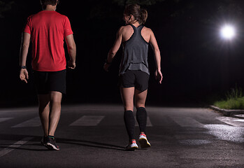 Image showing runners team on the night training