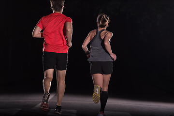 Image showing runners team on the night training