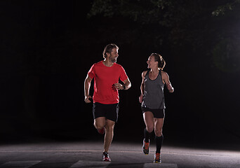 Image showing runners team on the night training