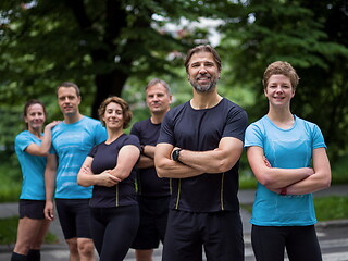 Image showing portrait of runners team on morning training