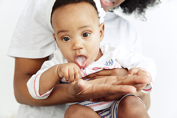 Image showing Portrait of beautiful african woman holding on hands her little baby