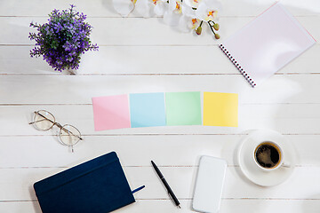 Image showing Message at colorful note papers on a desk background.