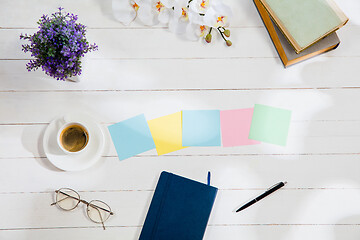 Image showing Message at colorful note papers on a desk background.