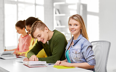 Image showing high school students with books and notebooks