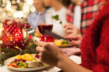 Image showing close up of friends having christmas dinner