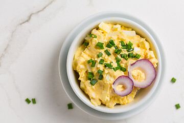 Image showing Egg spread with onion and chives on marble background