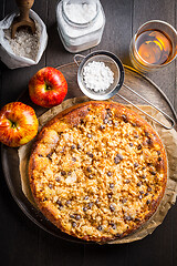 Image showing Delicious apple pie with chocolate pieces and ingredients for Thanksgiving